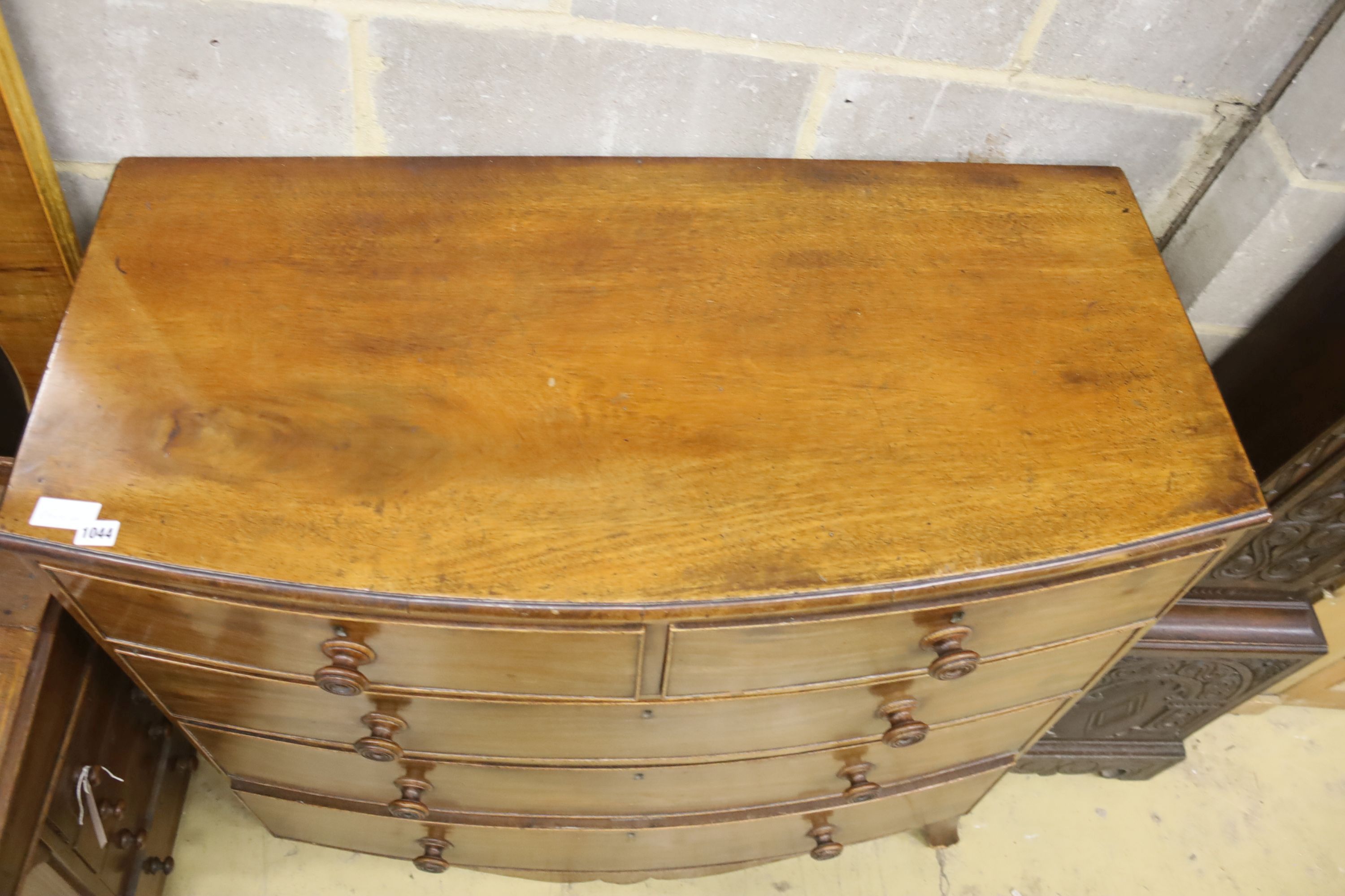 An early Victorian mahogany bow front chest (in need of restoration), width 108cm, depth 52cm, height 99cm